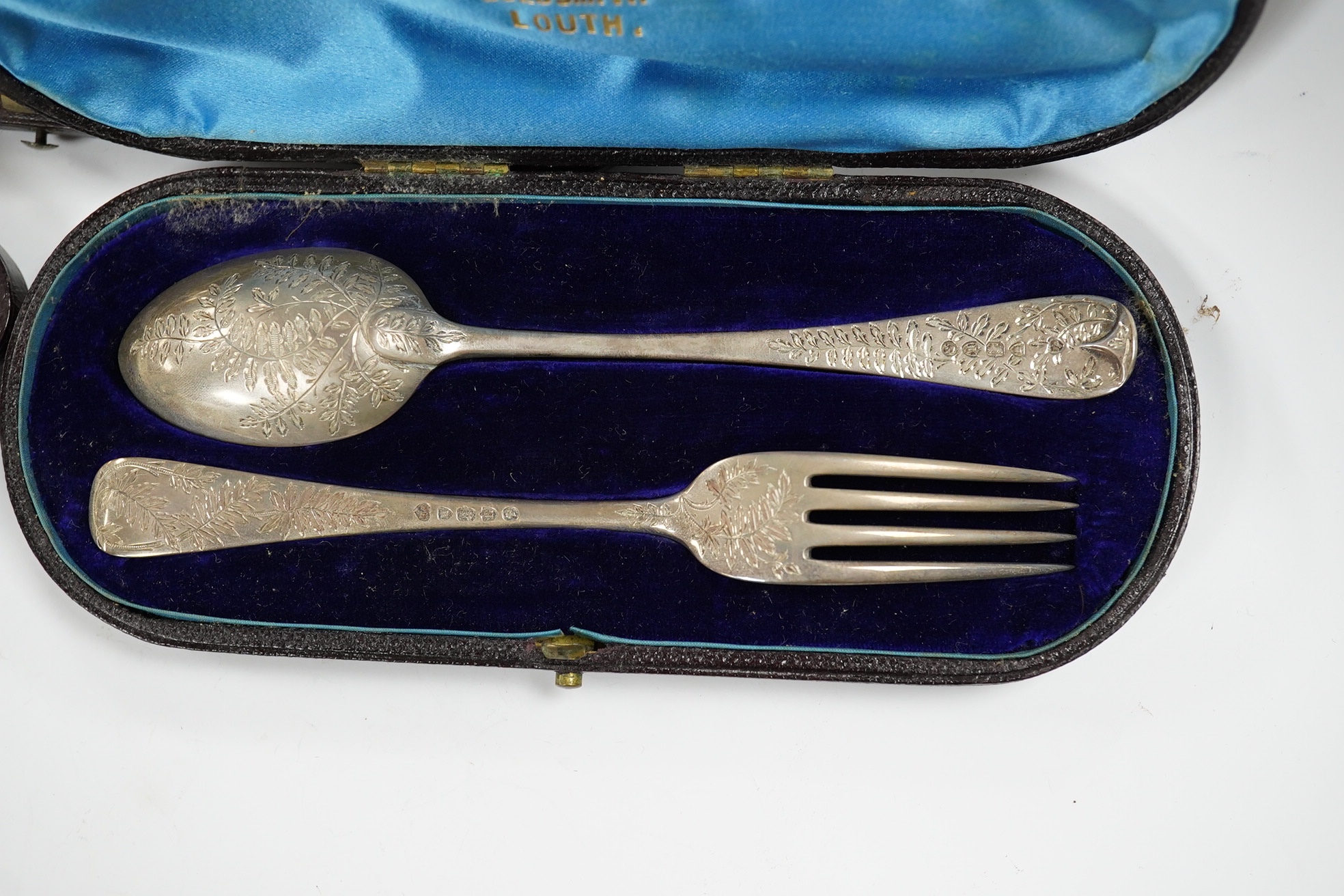 Three assorted Victorian cased silver christening sets, including London, 1880. Condition - fair.